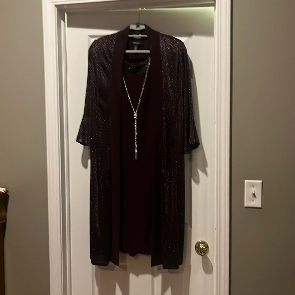Dress with coverall and attached necklace